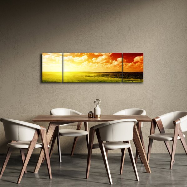 Obraz louky se zářícím sluncem (170x50 cm)