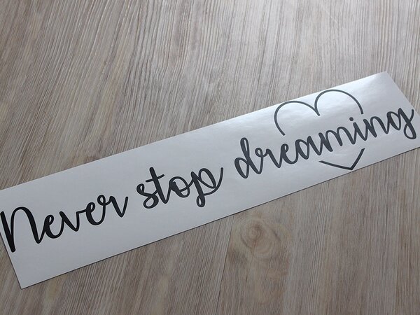 Never stop dreaming samolepka na zeď 75 x 17 cm