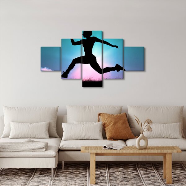 Obraz skákající siluety ženy (125x70 cm)