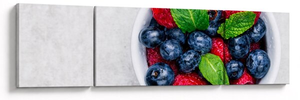 Obraz - miska s lesním ovocem (170x50 cm)