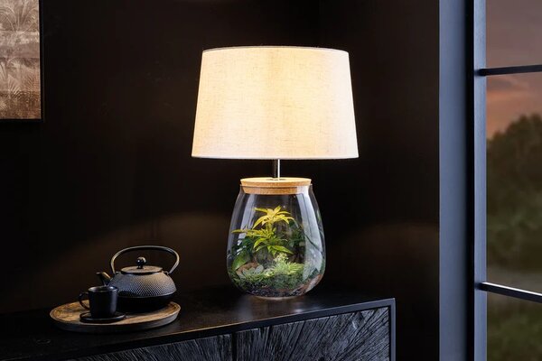 Stylová skleněná stolní lampa Clasico s nohou v podobě průsvitné nádoby s válcovým béžovým stínítkem 60 cm