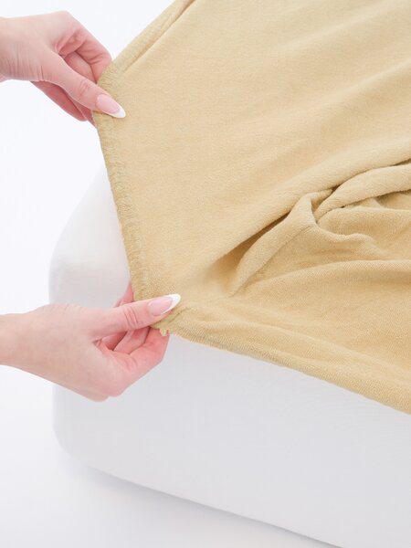 MK Lůžkoviny Froté prostěradlo do postýlky 60 × 120 cm - béžová