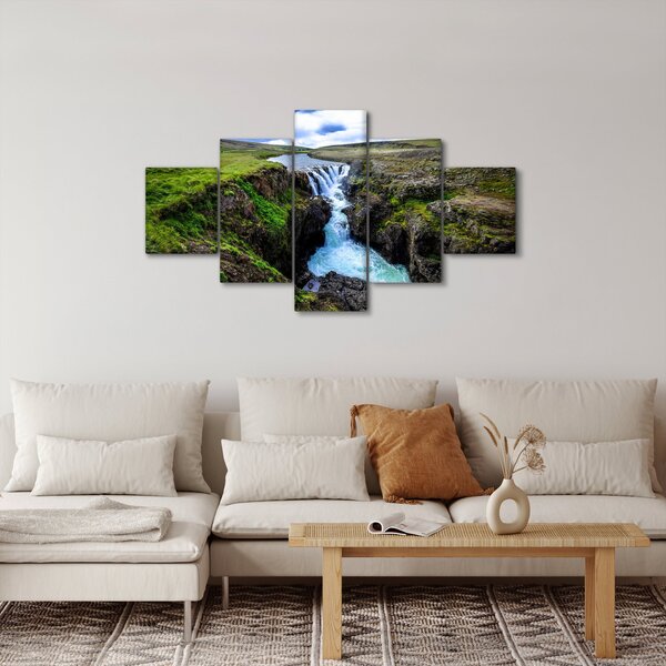 Obraz vodopádu mezi skalami (125x70 cm)