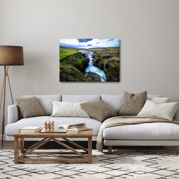 Obraz vodopádu mezi skalami (70x50 cm)