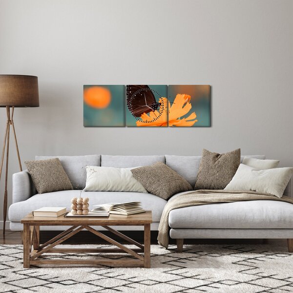 Obraz - motýl na oranžové květině (s hodinami) (90x30 cm)