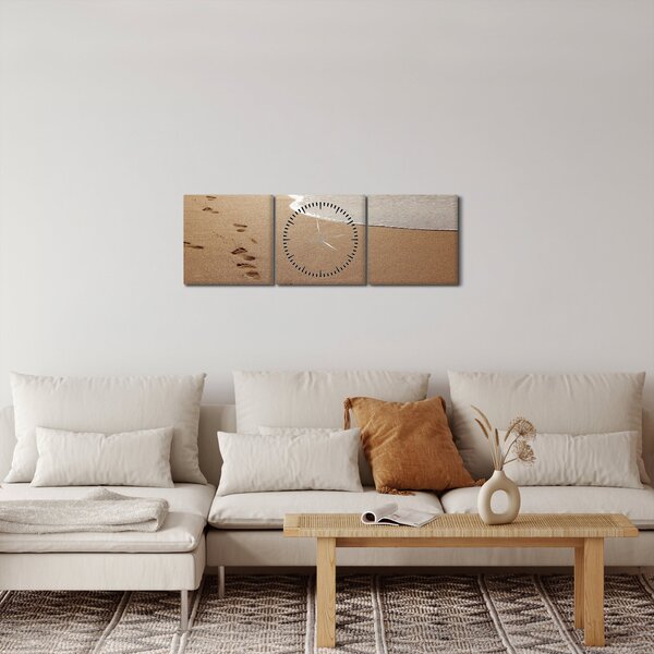 Obraz - stopy v písku a moře (s hodinami) (90x30 cm)