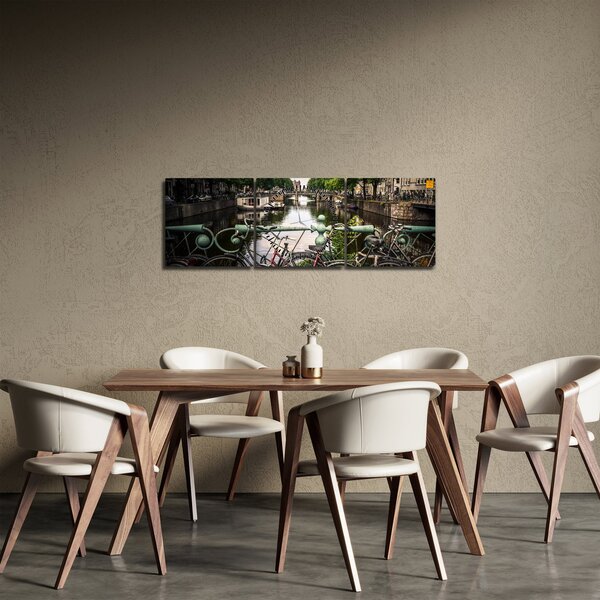 Obraz kola ve městě (s hodinami) (90x30 cm)