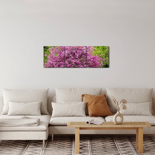 Obraz rozkvetlého stromu na louce (s hodinami) (90x30 cm)