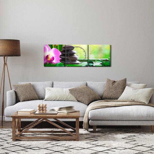 Obraz masážních kamenů a orchidee na vodě (s hodinami) (90x30 cm)
