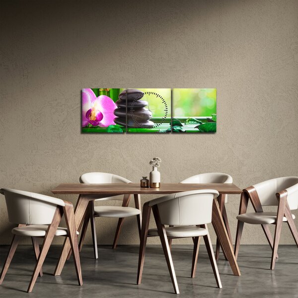 Obraz masážních kamenů a orchidee na vodě (s hodinami) (90x30 cm)