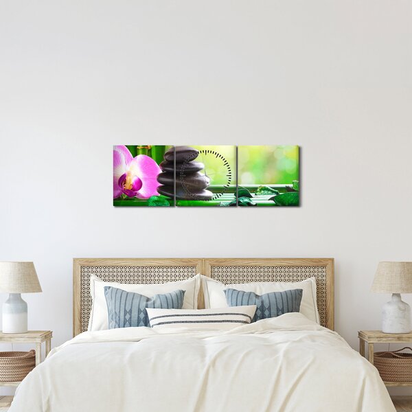 Obraz masážních kamenů a orchidee na vodě (s hodinami) (90x30 cm)