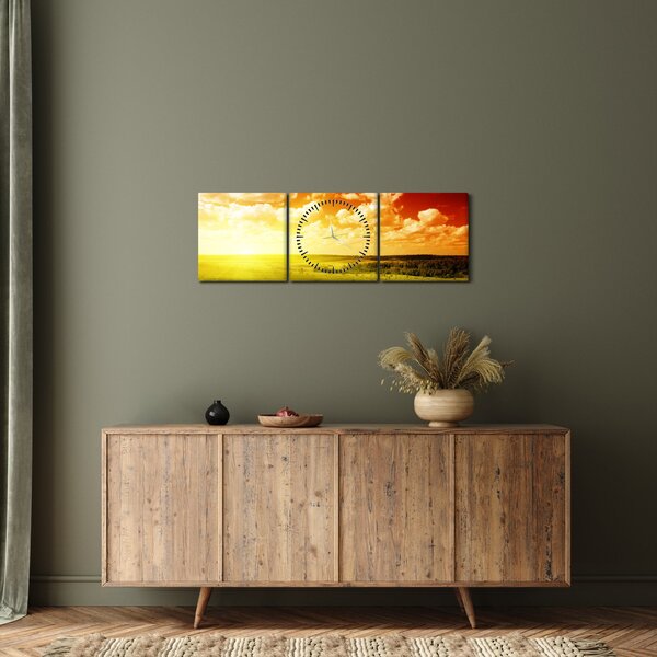 Obraz louky se zářícím sluncem (s hodinami) (90x30 cm)