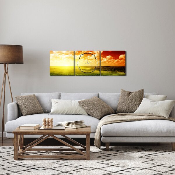 Obraz louky se zářícím sluncem (s hodinami) (90x30 cm)