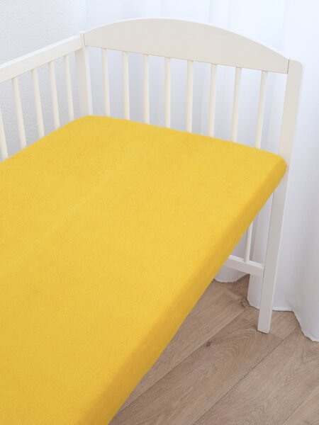 MK Lůžkoviny Froté prostěradlo do postýlky 60 × 120 cm - hořčicová