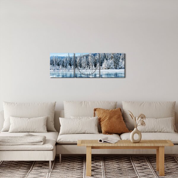 Obraz zamrzlého jezera a zasněžených stromů (s hodinami) (90x30 cm)