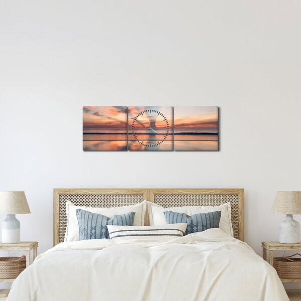 Obraz slunečních paprsků nad Daytonskou pláži (s hodinami) (90x30 cm)