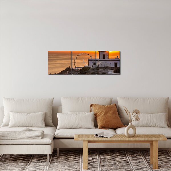 Obraz majáku při západu slunce (s hodinami) (90x30 cm)