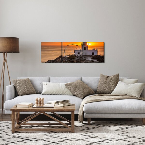 Obraz majáku při západu slunce (s hodinami) (90x30 cm)