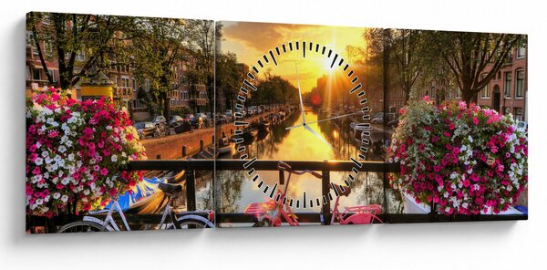 Obraz - Východ slunce v Amsterdamu (s hodinami) (90x30 cm)