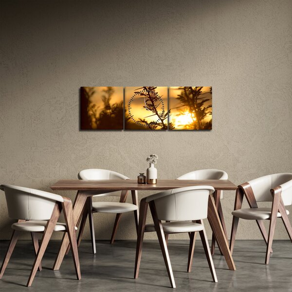 Obraz - Slunce zapadající za stromy (s hodinami) (90x30 cm)