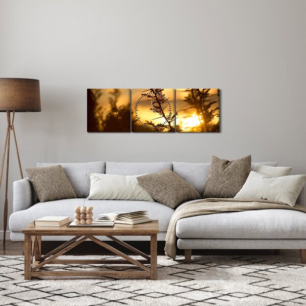 Obraz - Slunce zapadající za stromy (s hodinami) (90x30 cm)