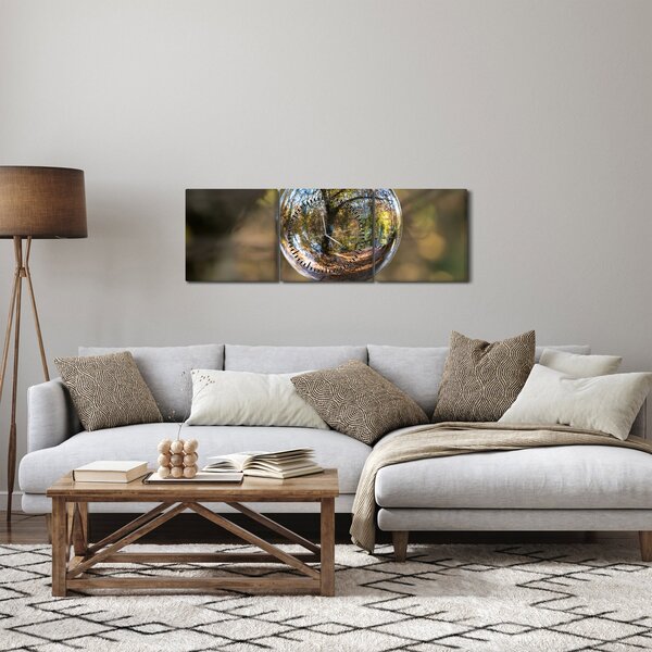Obraz - Odraz ve skleněné kouli (s hodinami) (90x30 cm)