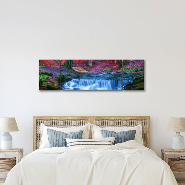 Obraz vodopádu v červeném lese (170x50 cm)