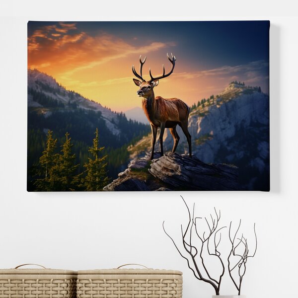Obraz na plátně - Jelen na skále s magickým západem slunce FeelHappy.cz Rozměr obrazu (Šířka x Výška): 40 x 30 cm