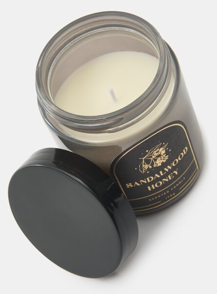 Sinsay - Vonná svíčka Sandalwood Honey - černá