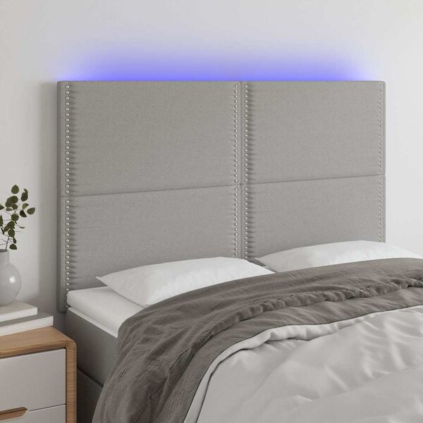 Čelo postele s LED světle šedé 144x5x118/128 cm textil 3122282