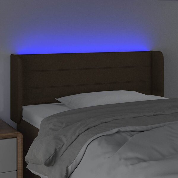 Čelo postele s LED tmavě hnědé 103 x 16 x 78/88 cm textil 3123369