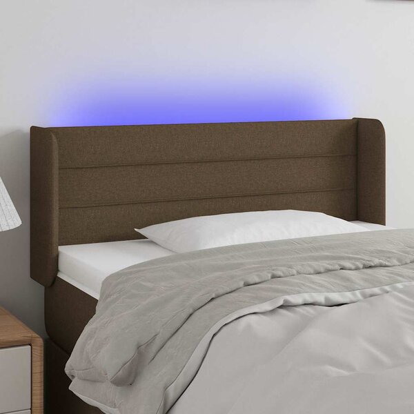 Čelo postele s LED tmavě hnědé 103 x 16 x 78/88 cm textil 3123369