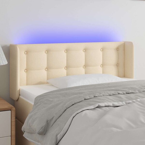 Čelo postele s LED krémové 83 x 16 x 78/88 cm textil 3123649
