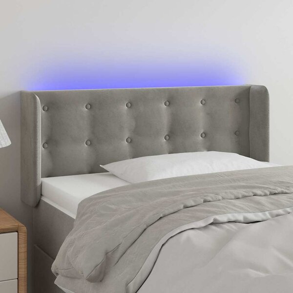 Čelo postele s LED světle šedé 103 x 16 x 78/88 cm samet 3123712