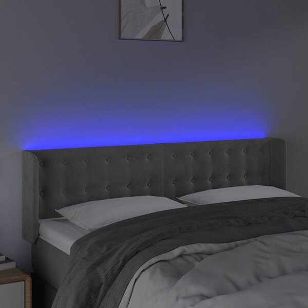Čelo postele s LED světle šedé 147 x 16 x 78/88 cm samet 3123718