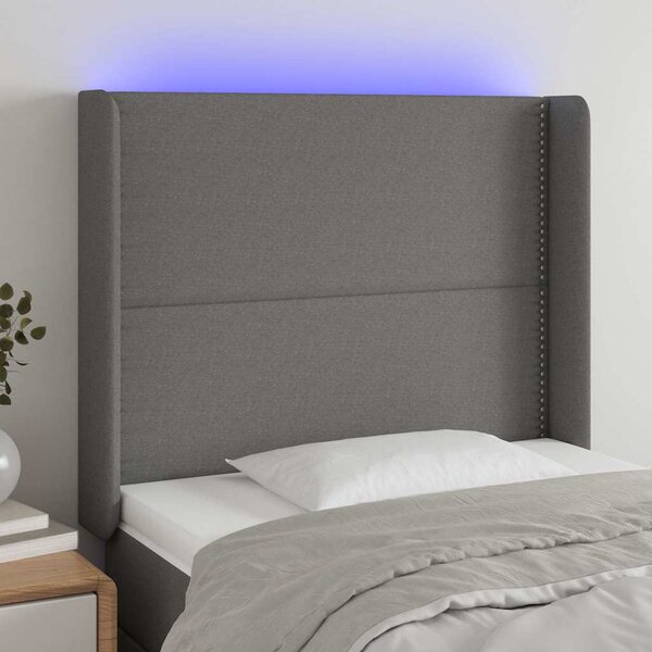Čelo postele s LED tmavě šedé 103 x 16 x 118/128 cm textil 3123899
