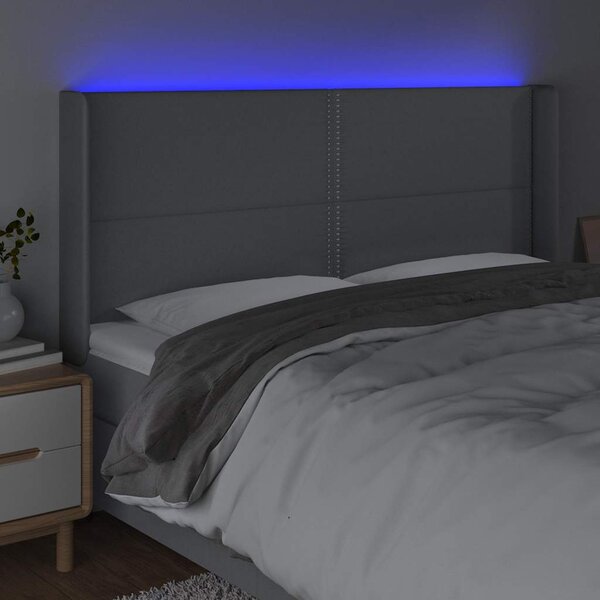 Čelo postele s LED světle šedé 203x16x118/128 cm textil 3123930