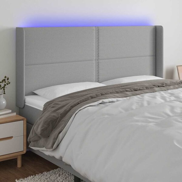 Čelo postele s LED světle šedé 203x16x118/128 cm textil 3123930