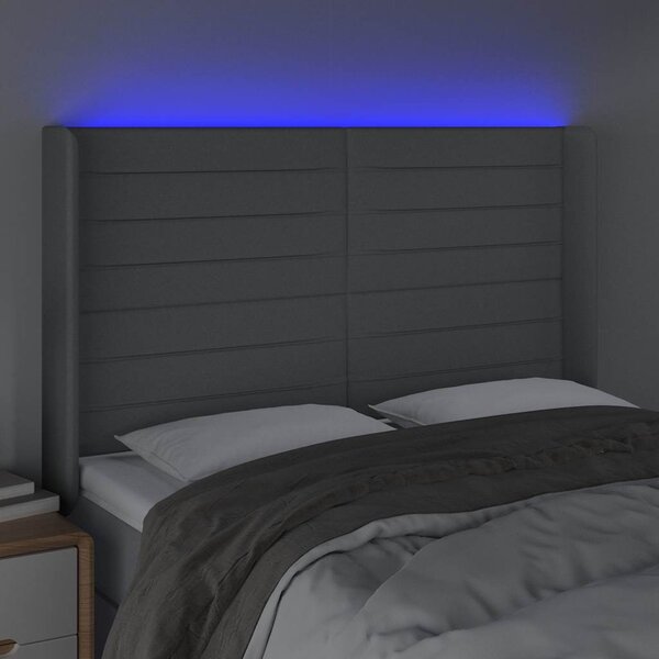 Čelo postele s LED světle šedé 147x16x118/128 cm textil 3124186