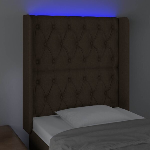 Čelo postele s LED tmavě hnědé 83 x 16 x 118/128 cm textil 3124361