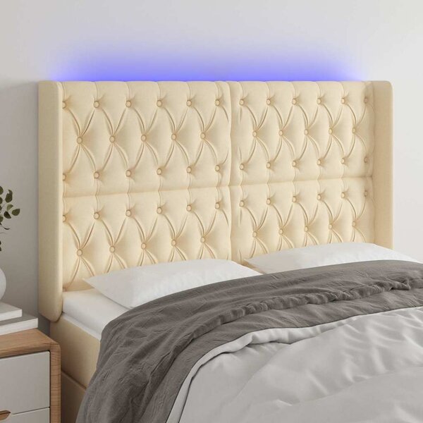 Čelo postele s LED krémové 147 x 16 x 118/128 cm textil 3124387