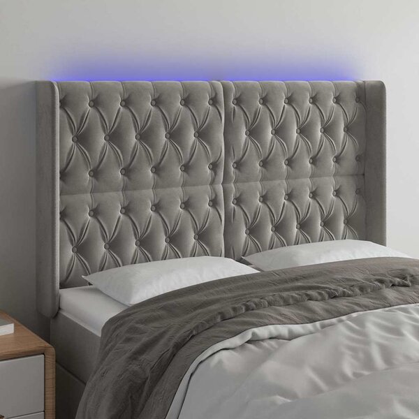 Čelo postele s LED světle šedé 163 x 16 x 118/128 cm samet 3124438