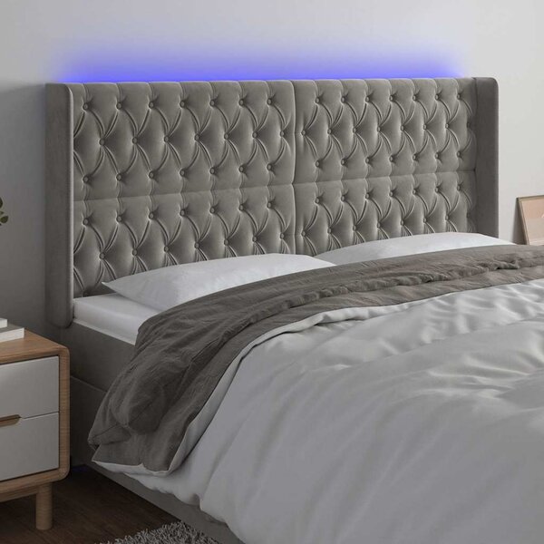 Čelo postele s LED světle šedé 183 x 16 x 118/128 cm samet 3124444