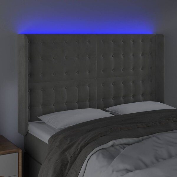 Čelo postele s LED světle šedé 147x16x118/128 cm samet 3124530