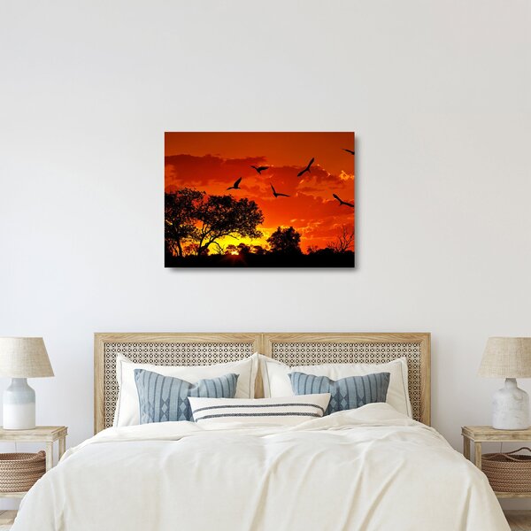 Skleněný obraz ptáků při západu slunce (70x50 cm)