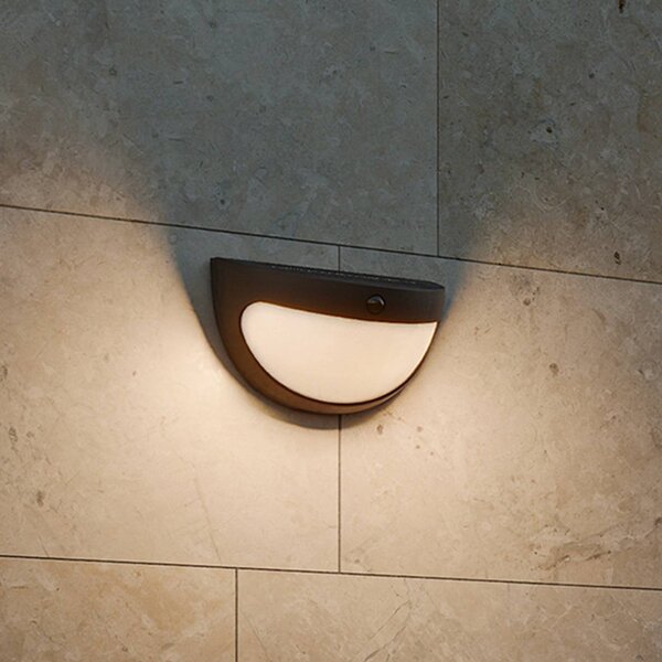 Philips LED solární nástěnné svítidlo Swyn, černé, se senzorem, IP44, Černá, Plast