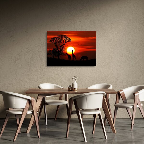 Skleněný obraz - Siluety zvířat při západu slunce (70x50 cm)