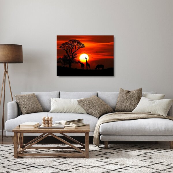 Skleněný obraz - Siluety zvířat při západu slunce (70x50 cm)