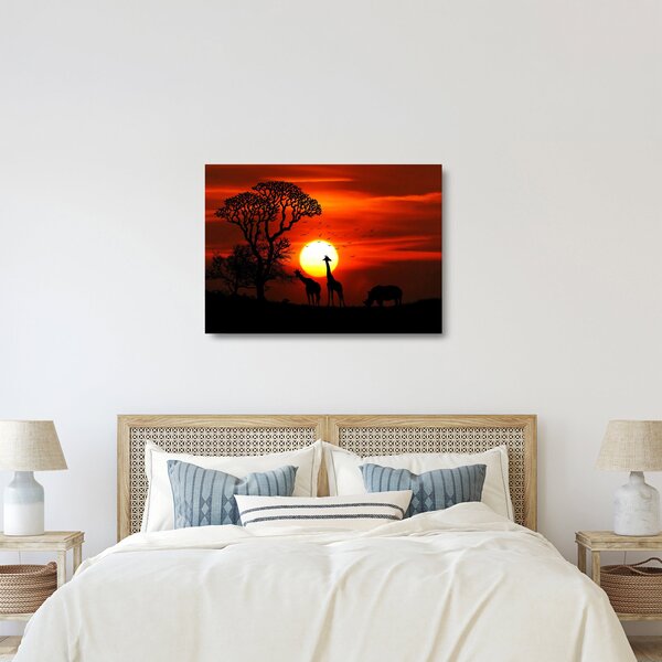 Skleněný obraz - Siluety zvířat při západu slunce (70x50 cm)