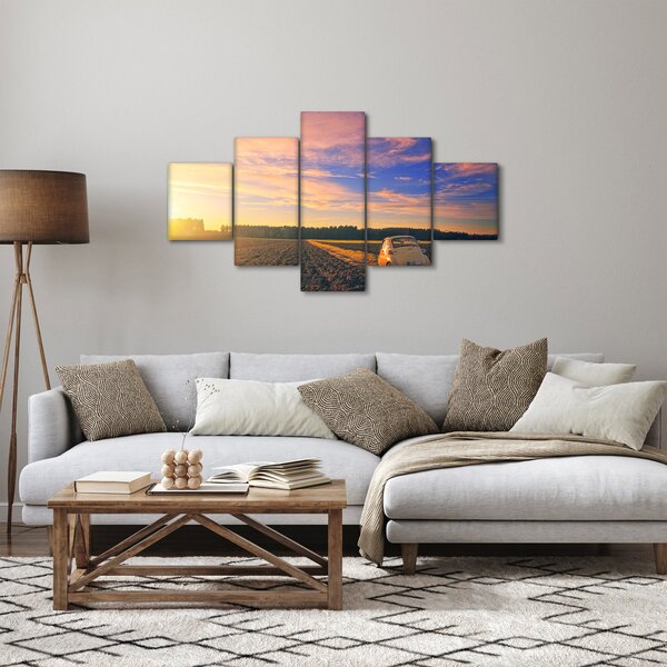 Obraz žlutého auta v poli (125x70 cm)